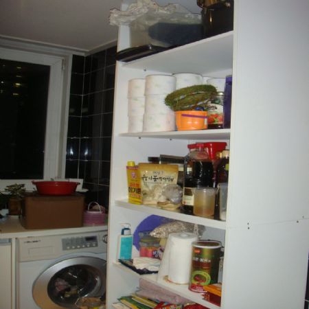 맞춤형 목재로 만든 주방 수납장